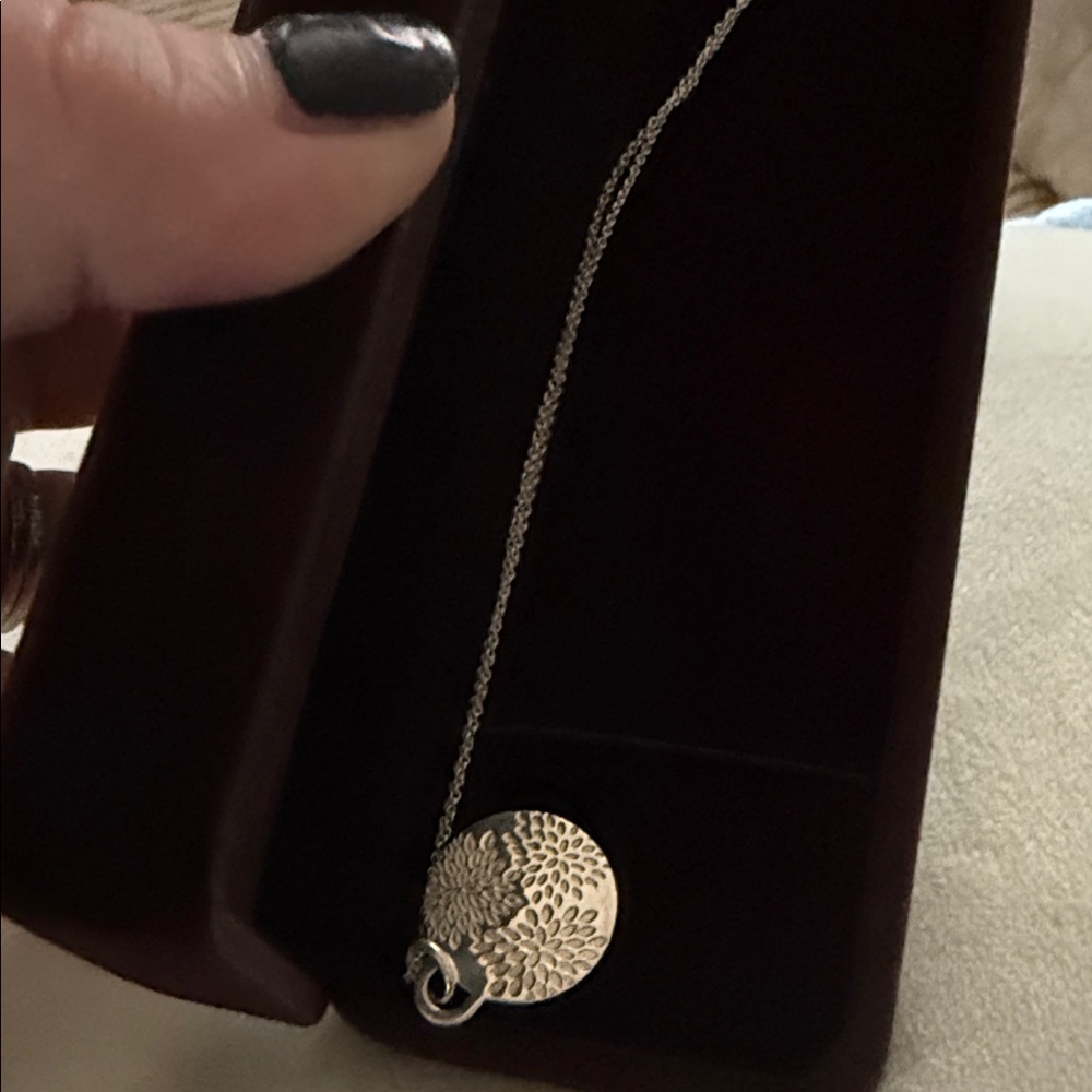 Tiffany&Co Silver Necklace with Go Women 2018 charm.